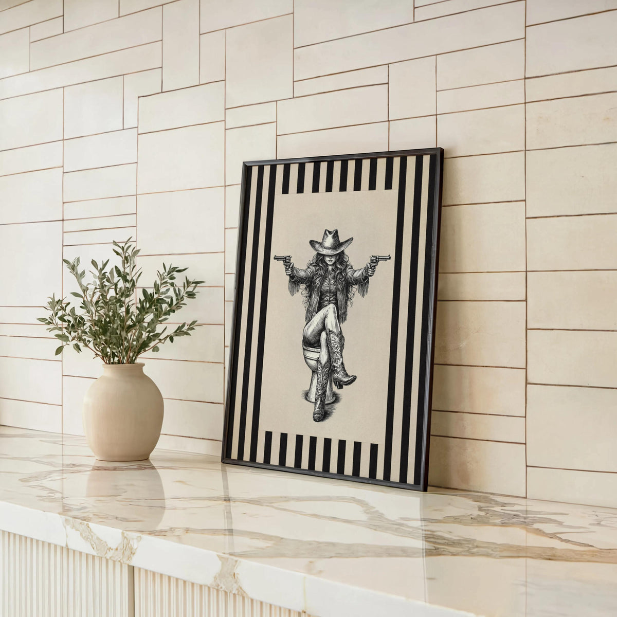Cowgirl on toilet print leaning on tiled bathroom counter, neutral tiles, cowgirl bathroom decor