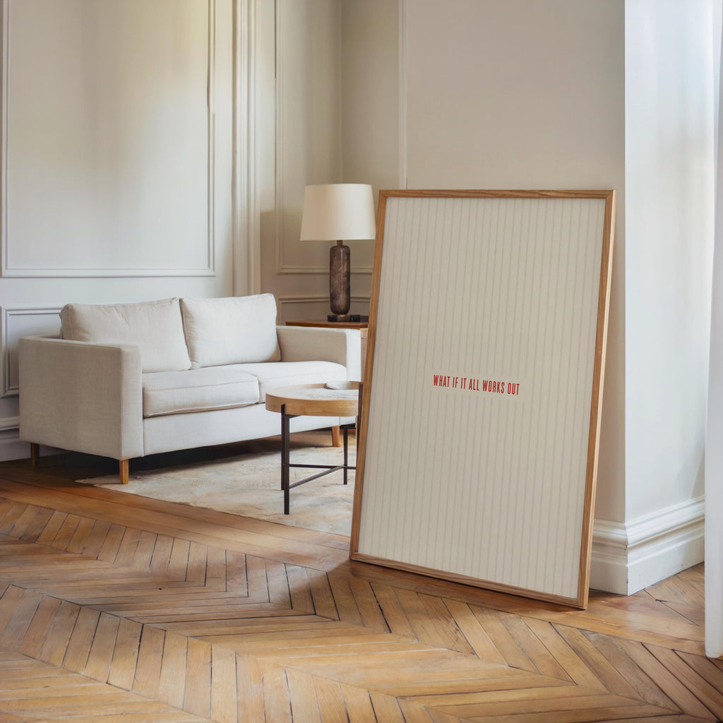 Leaning modern typography wall decor, what if it all works out print staged in a bright living room