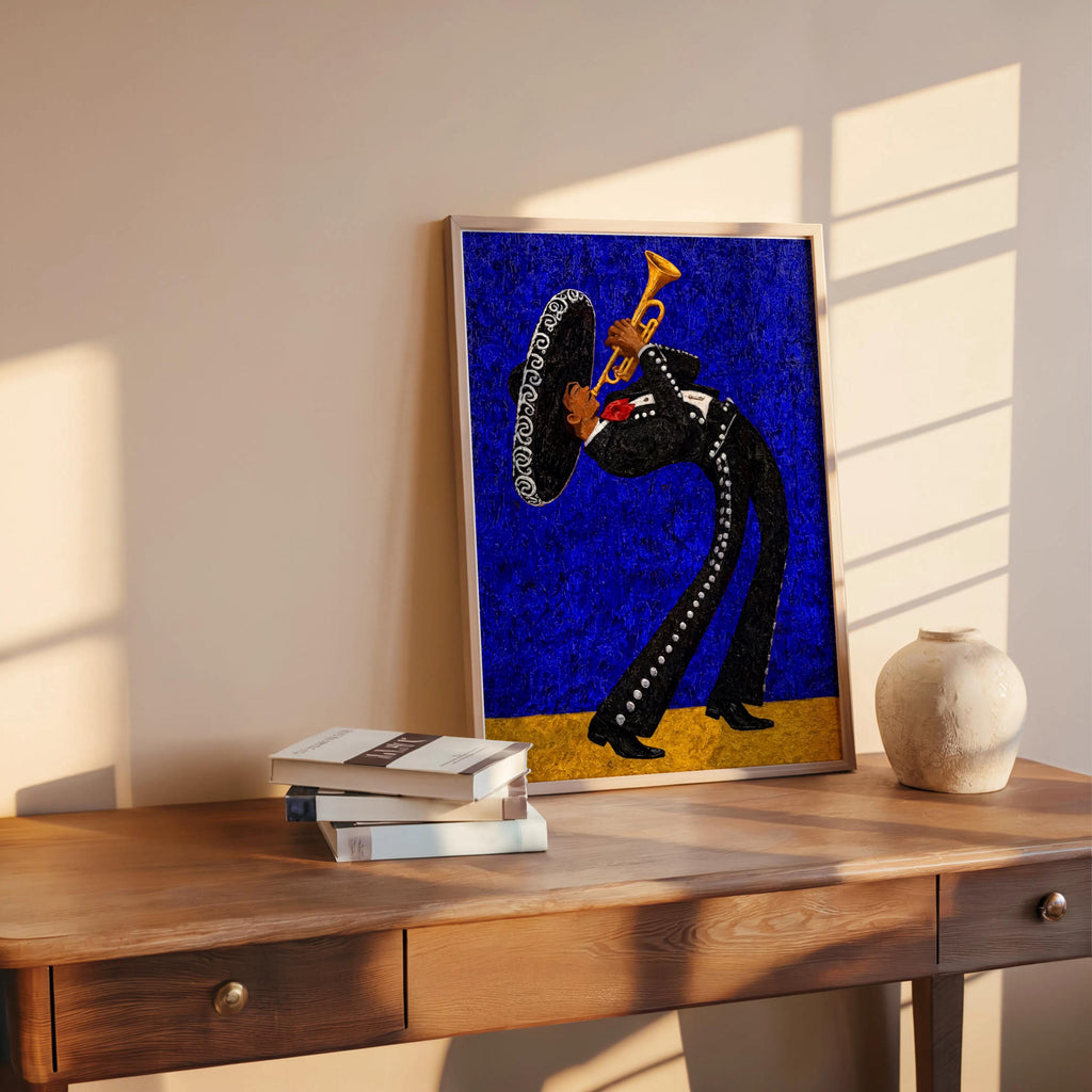Blue mariachi wall art print leaning on table right, vibrant glitter texture, trumpet player silhouette with gold base strip