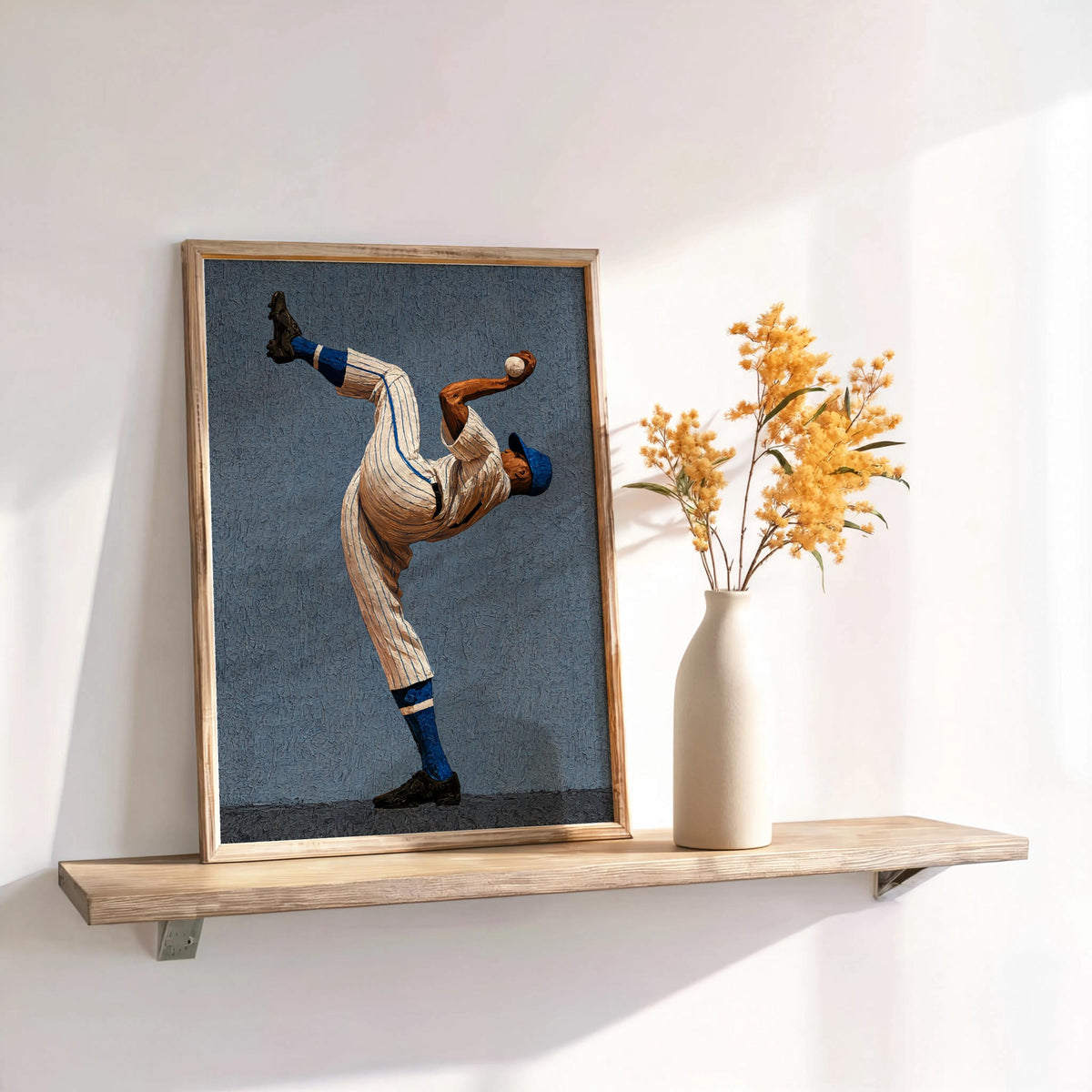 Shelved framed blue textured print with dried flowers and soft light, Afrocentric baseball player print, baseball pitcher wall art for sports room