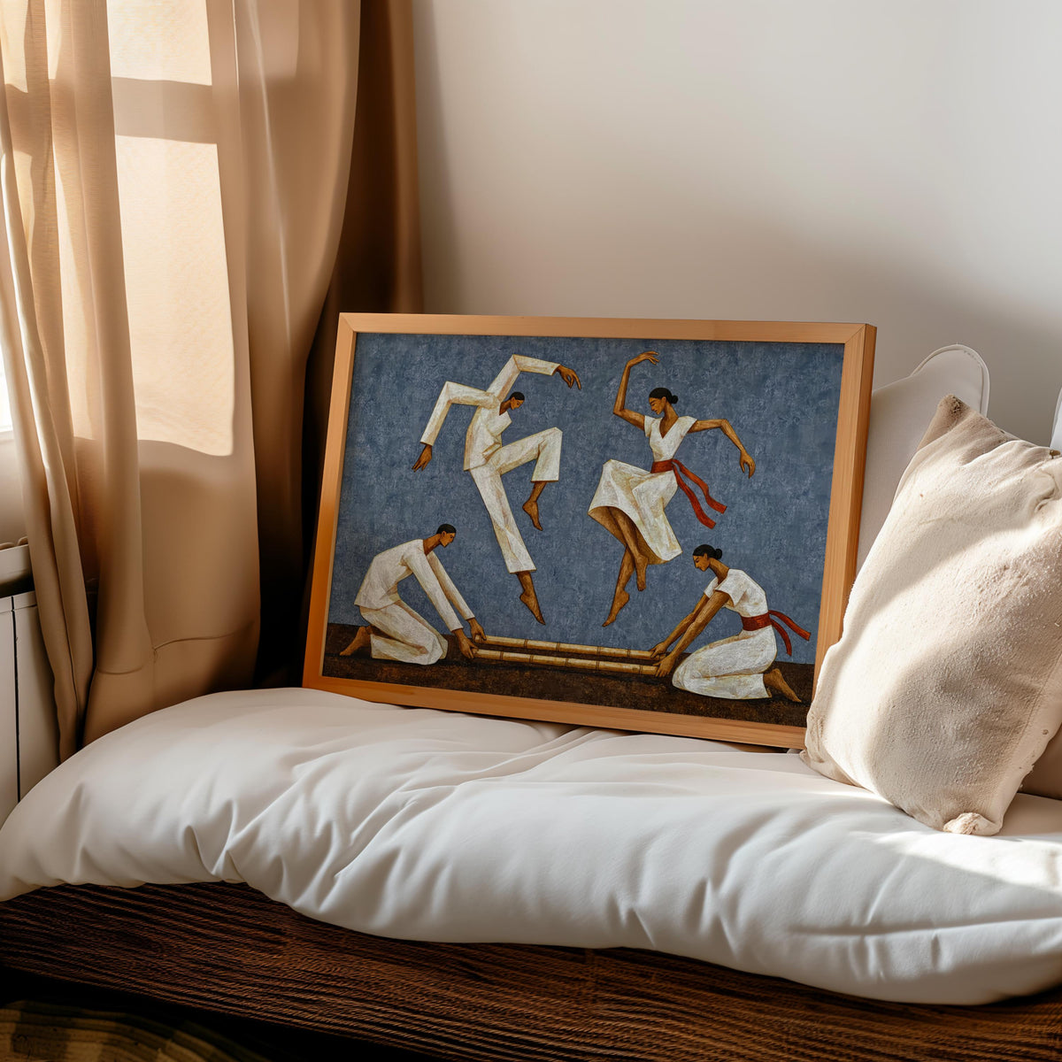 Slate blue Tinikling art print leaning on a cushioned bed, Southeast Asian wall art mood in soft light