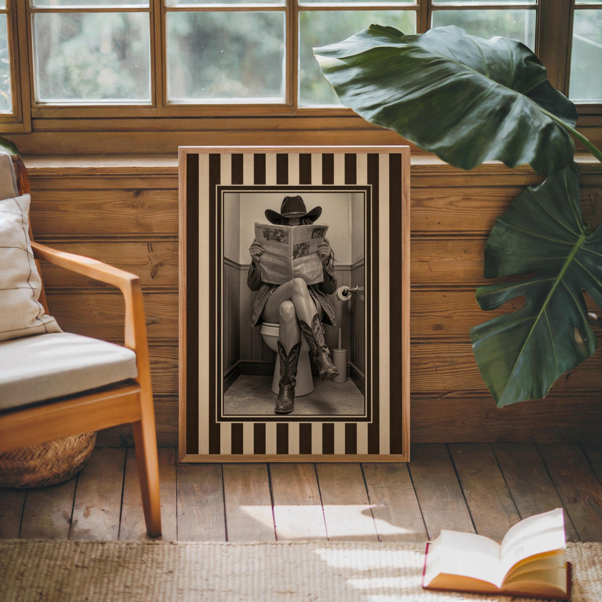 Cozy window bench display, framed sepia cowgirl on toilet with striped border, western bathroom decor vibe, funny cowgirl bathroom wall art