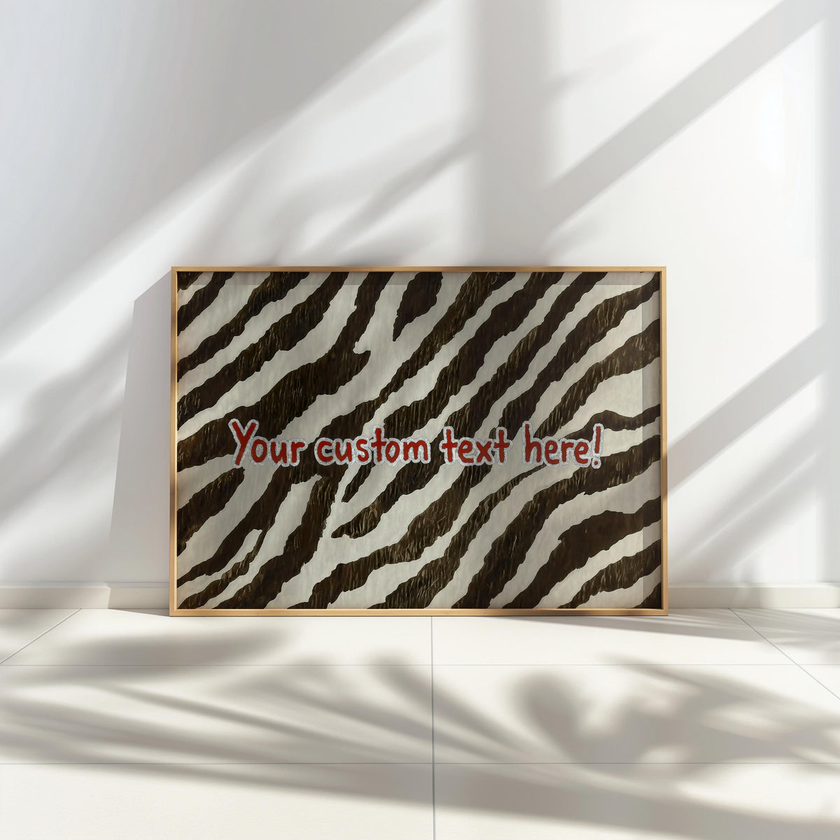 Personalized zebra print wall art propped on a low shelf, warm sunlight highlights brown and cream stripes