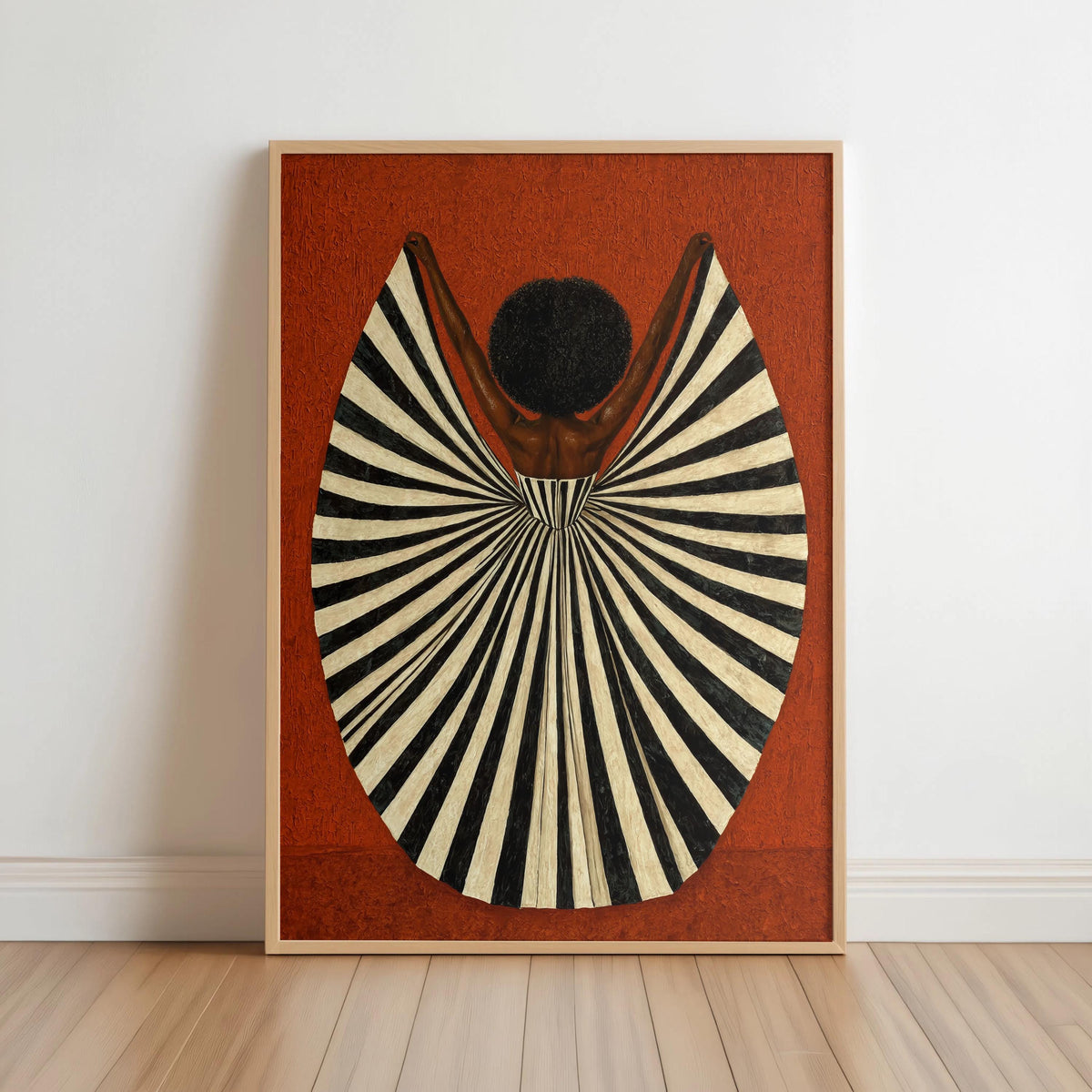 Rust orange framed print leaning on floor, vintage-inspired palette and bold silhouette, abstract black woman wall art