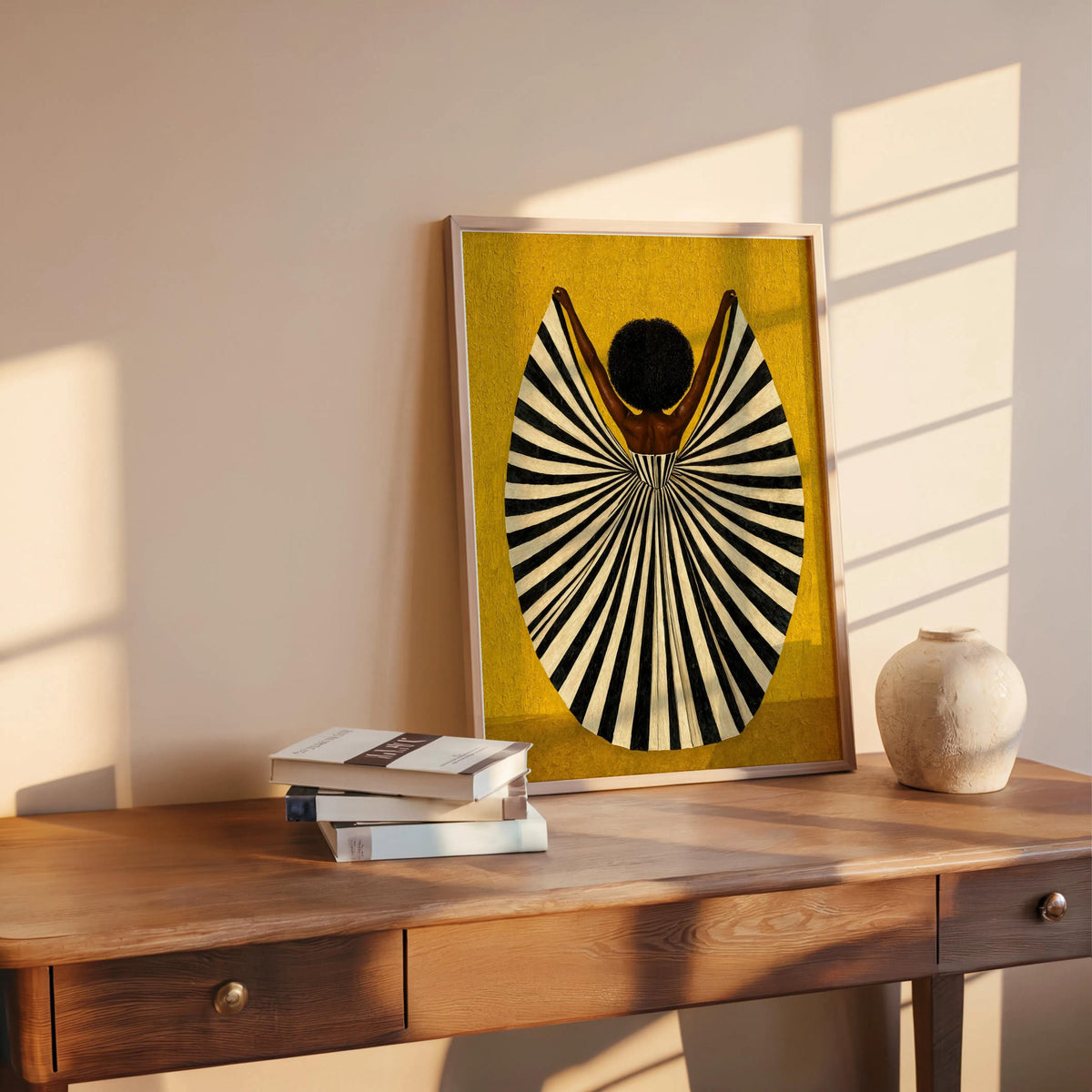 Golden yellow print leaning on shelf beside books, mid century modern wall art vibe, abstract black woman wall art