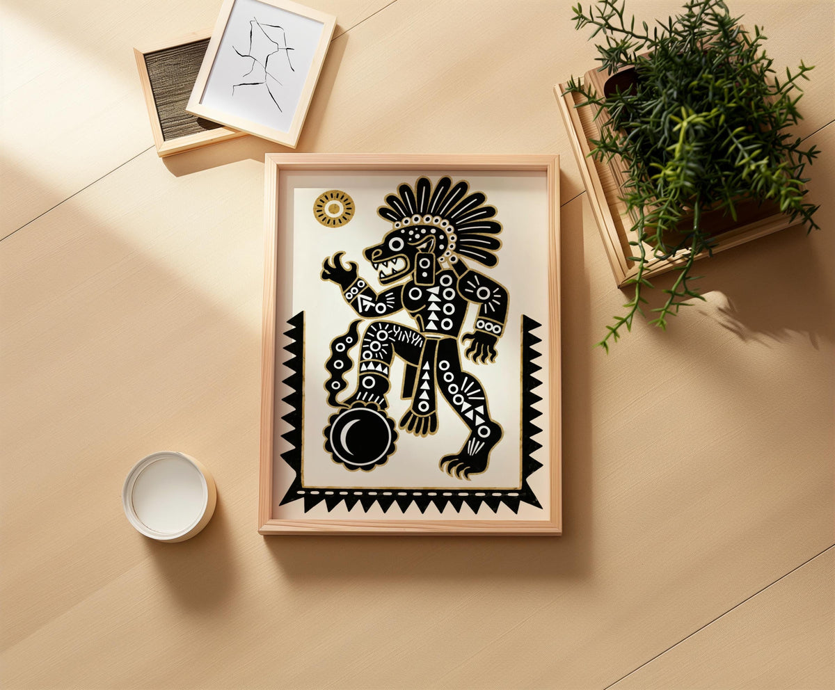 Tezcatlipoca art print laid flat on textured tan surface, styled with cup and greenery, indigenous Mexican art feel