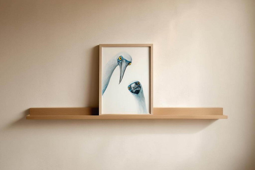 Small frame centered on a floating shelf, neutral wall and minimalist vibe, coastal bird wall decor, blue footed booby wall art print