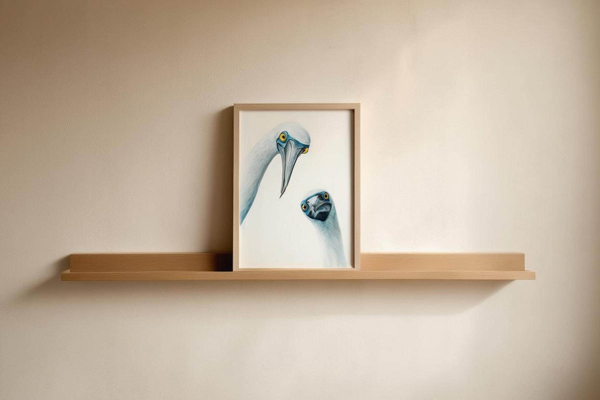 Small frame centered on a floating shelf, neutral wall and minimalist vibe, coastal bird wall decor, blue footed booby wall art print