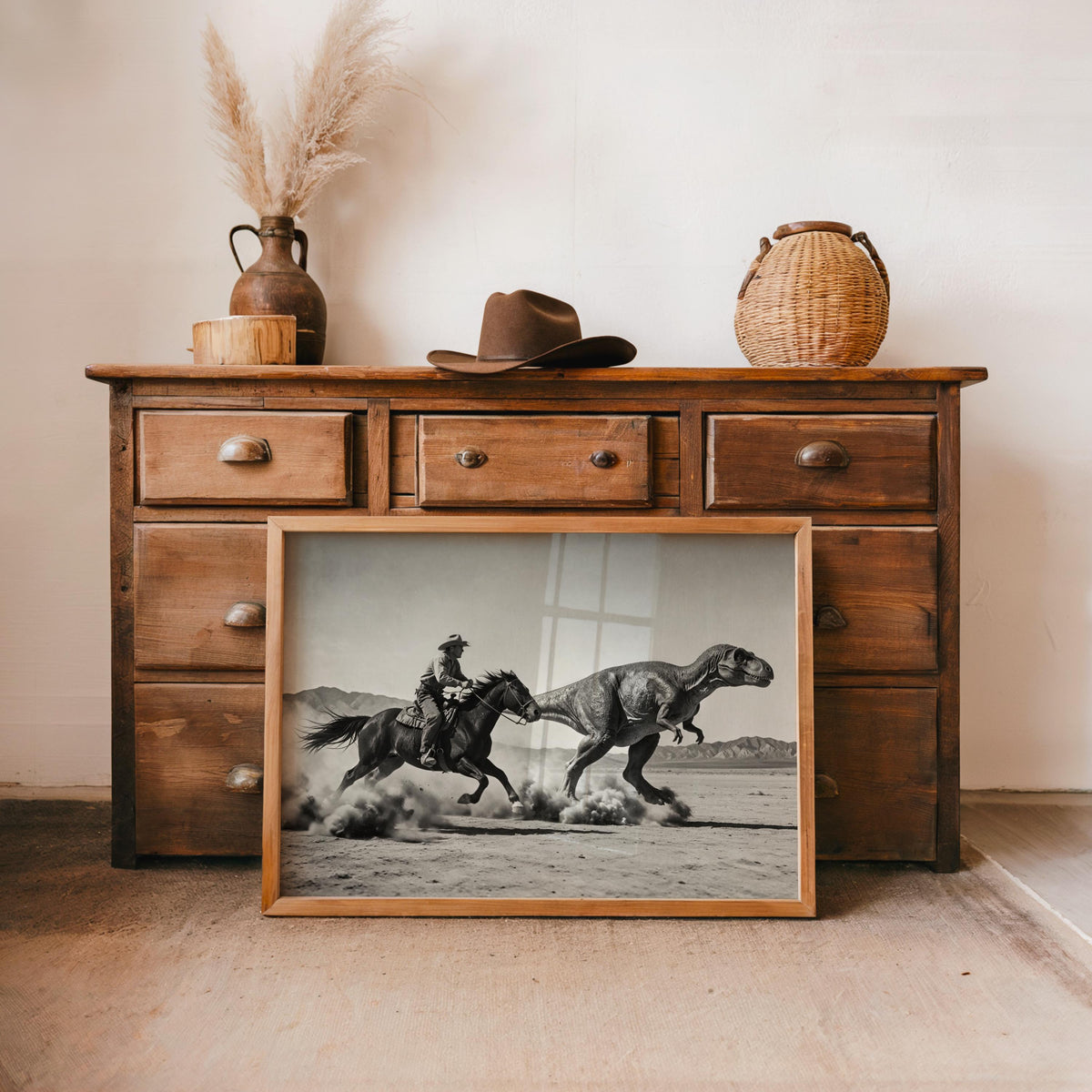 Cowboy dinosaur print leaning by rustic dresser, earthen pottery and warm wood tones, vintage dinosaur print ambiance