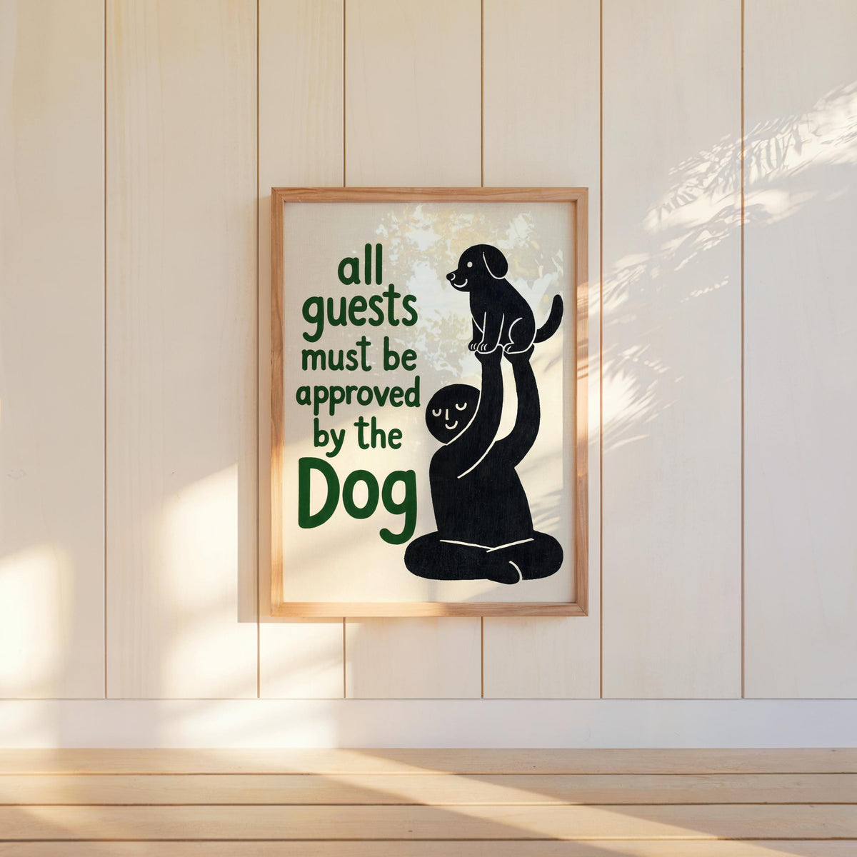 Framed black dog sketch with green 'Dog' word, vertical wall display in bright room, quirky dog art for dog owner gift