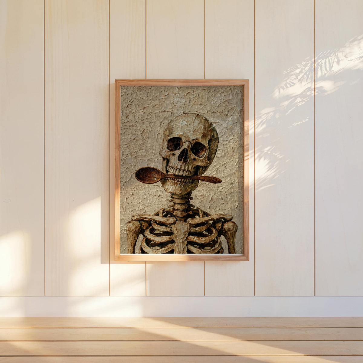 Wall-mounted skeleton chef wall art with oversized skull on white paneling, soft shadow, aged painterly finish.