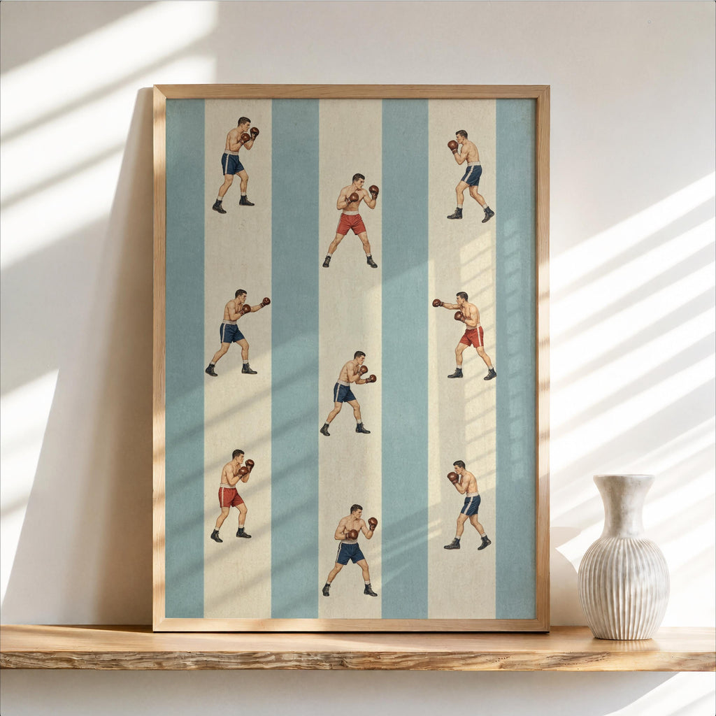 Framed blue striped vintage boxing wall art leaning on shelf, repeating illustrated fighters in vertical rows