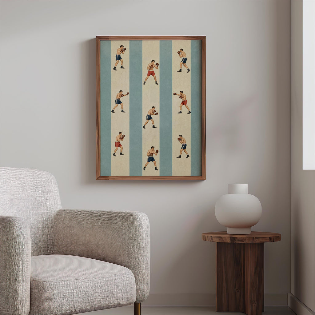Small framed boxing print above a side table and textured armchair, repeating fighter illustrations, boxing fan gift vibe