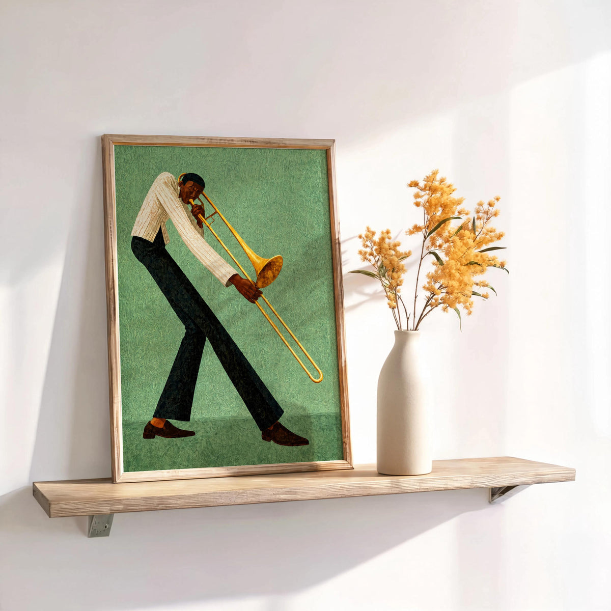 Jazz trombone wall art, mint framed print leaning on shelf beside vase, black culture wall art style.