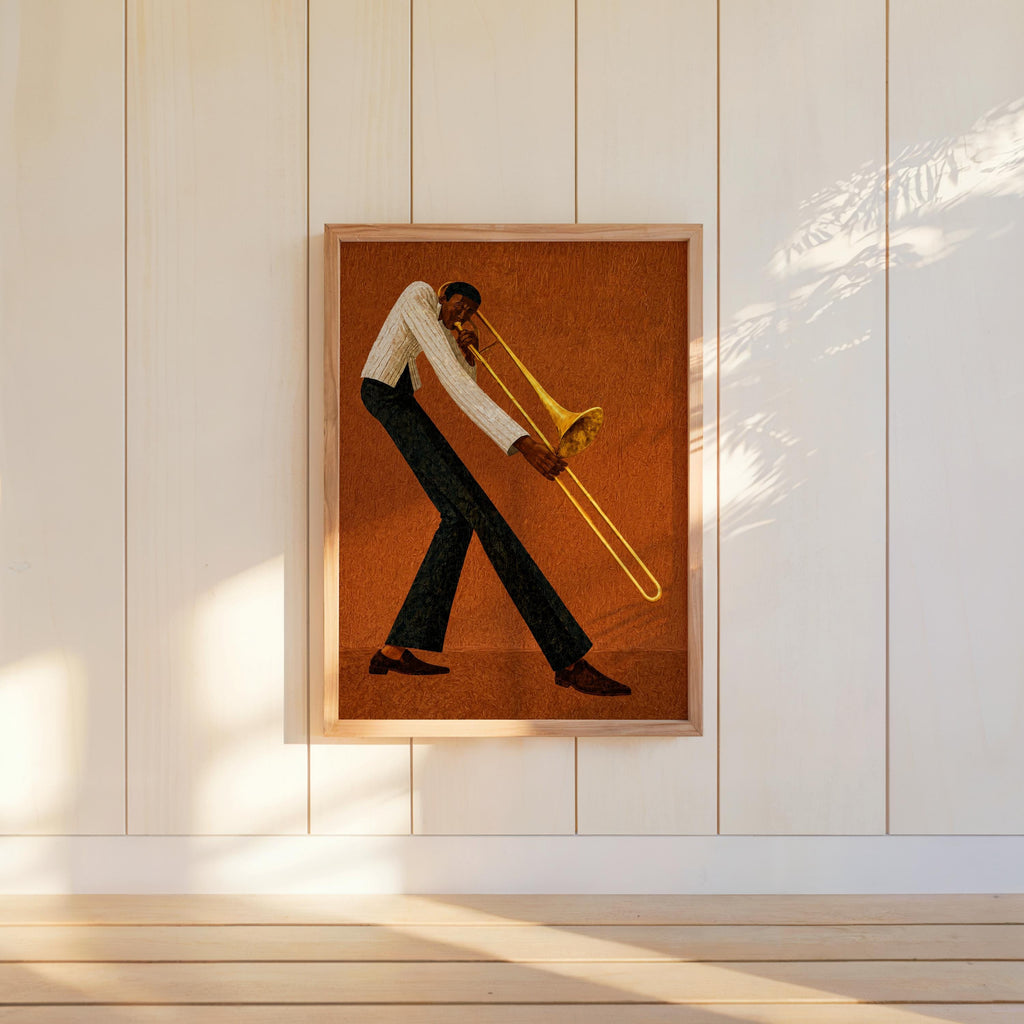 Jazz trombone wall art, warm rust framed poster on paneled wall, elongated player with golden trombone.