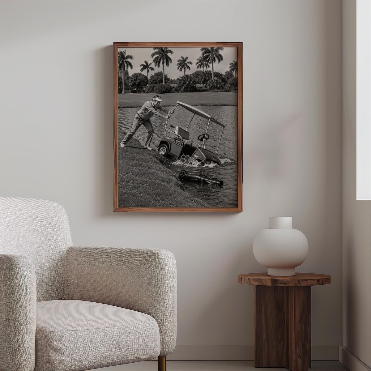 Angry golfer poster small wood frame centered on white wall above a side stool, retro poster vibe.