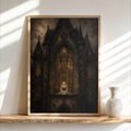 Framed gothic haunted house wall art on wooden shelf, ornate pointed arch, amber windows, small vase