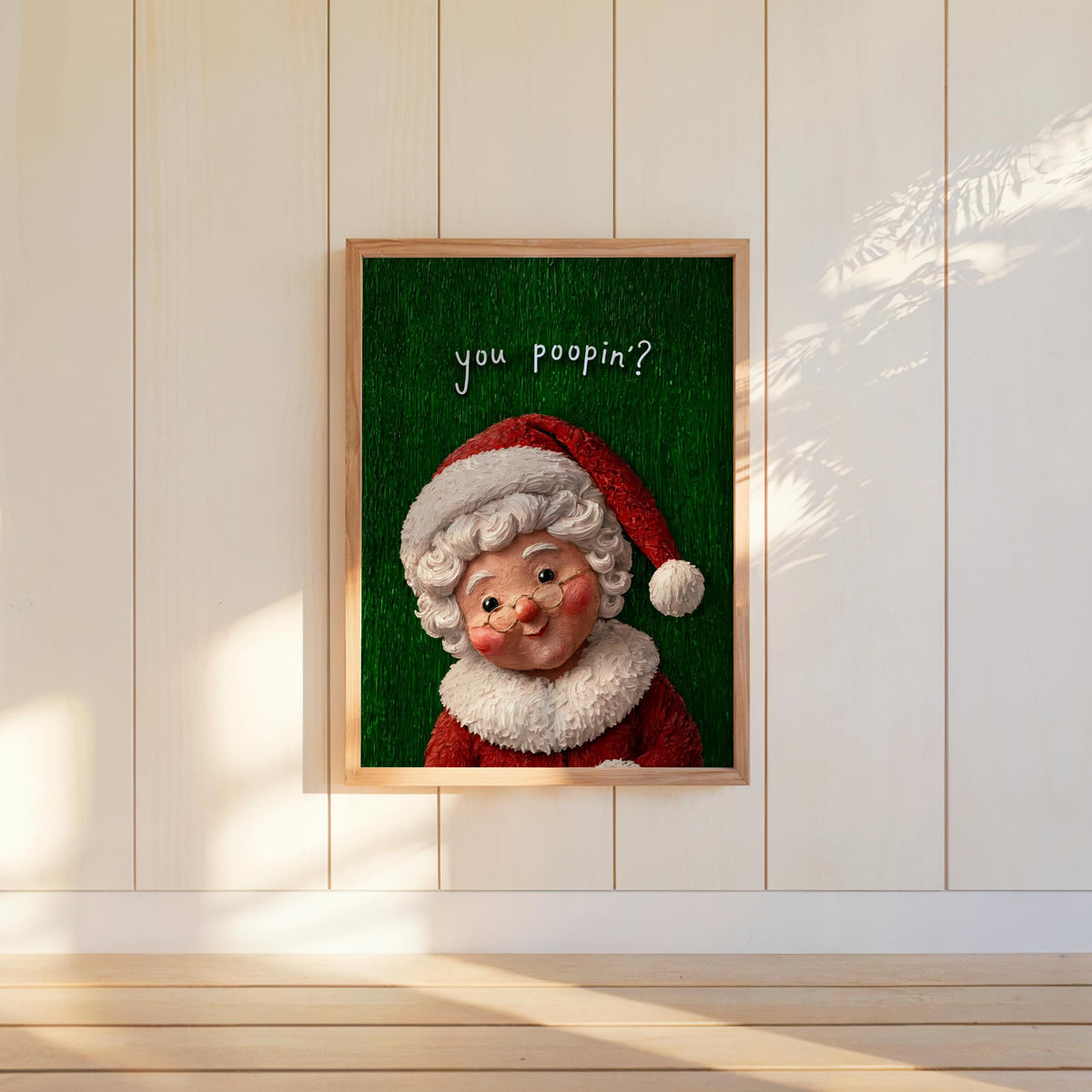 Centered framed Mrs Claus portrait on wall, green retro texture and soft shadows, vintage Christmas print, funny Christmas bathroom wall art