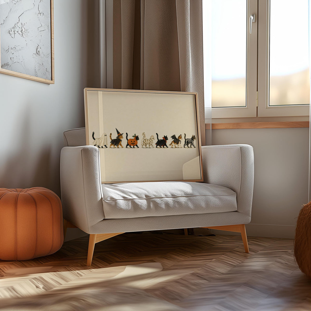 Halloween cat wall art propped on armchair with pumpkin, cute Halloween wall art, nostalgic palette.