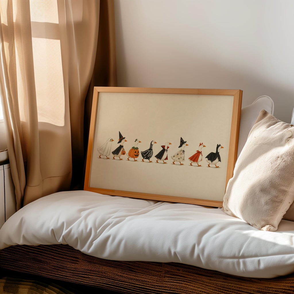 Cozy nook with Halloween duck print resting on daybed, muted earthy tones, whimsical Halloween art