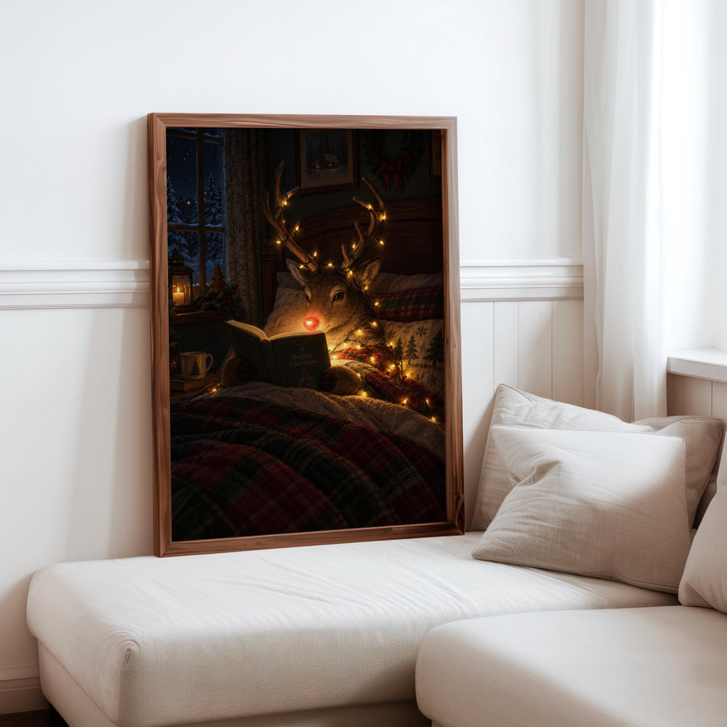Rudolph Christmas wall art resting on a sofa ledge, vintage-inspired reindeer reading, warm tones.