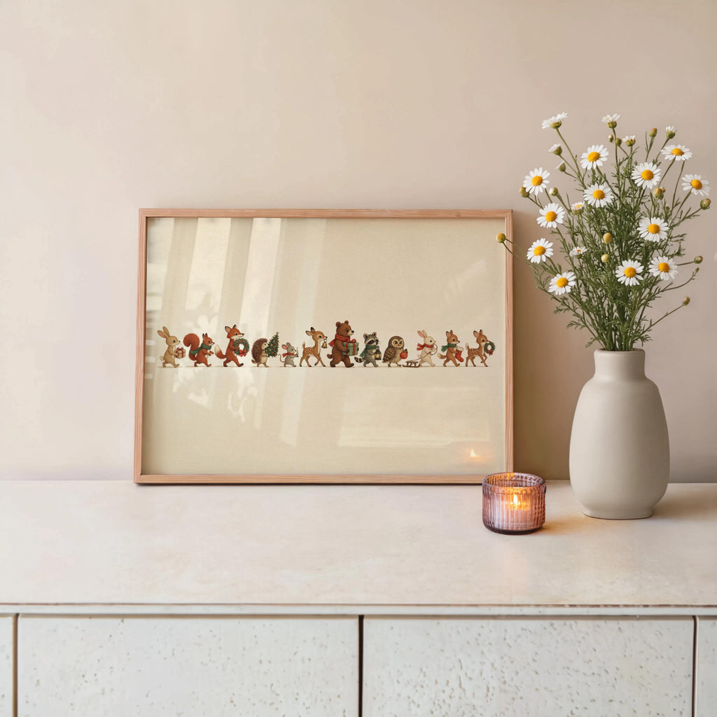 Hall console with vase and candle, framed Christmas woodland animals print hung, muted earthy storybook colors