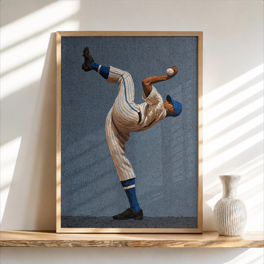 Framed portrait print with textured blue background, Afrocentric pitcher in dramatic windup, baseball pitcher wall art, framed mockup
