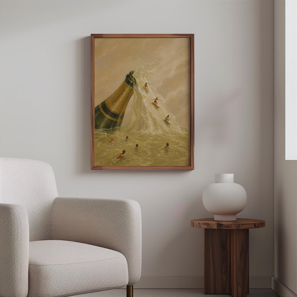Champagne bottle wall art framed on a light gray wall above boucle chair, muted gold stream and tiny swimmers