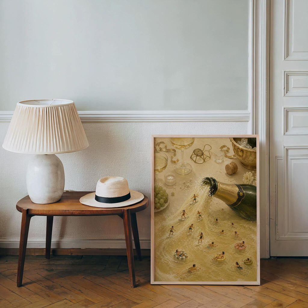 Vertical champagne bottle print propped by a lamp and side table, vintage painterly charm