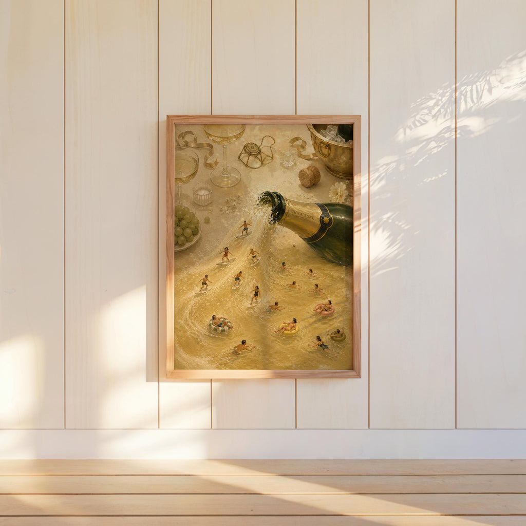 Framed surreal champagne art hung on pale shiplap, warm light and golden bubbles in view