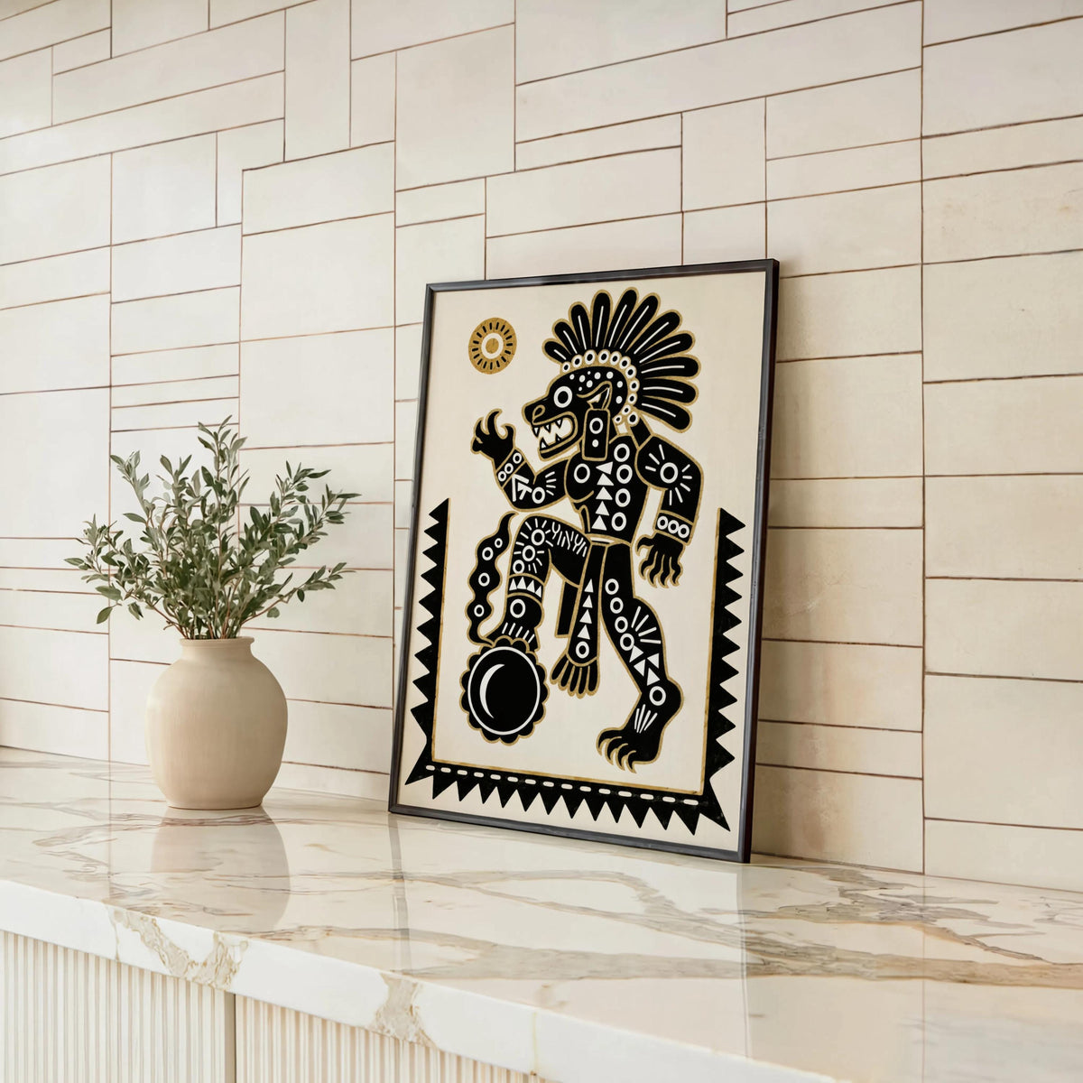 Tezcatlipoca art print against white tiled wall, marble ledge with small plant, Mexican folk art print vibe