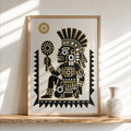 Framed Tezcatlipoca art print leaning on a sunlit shelf, bold black graphic with gold accents