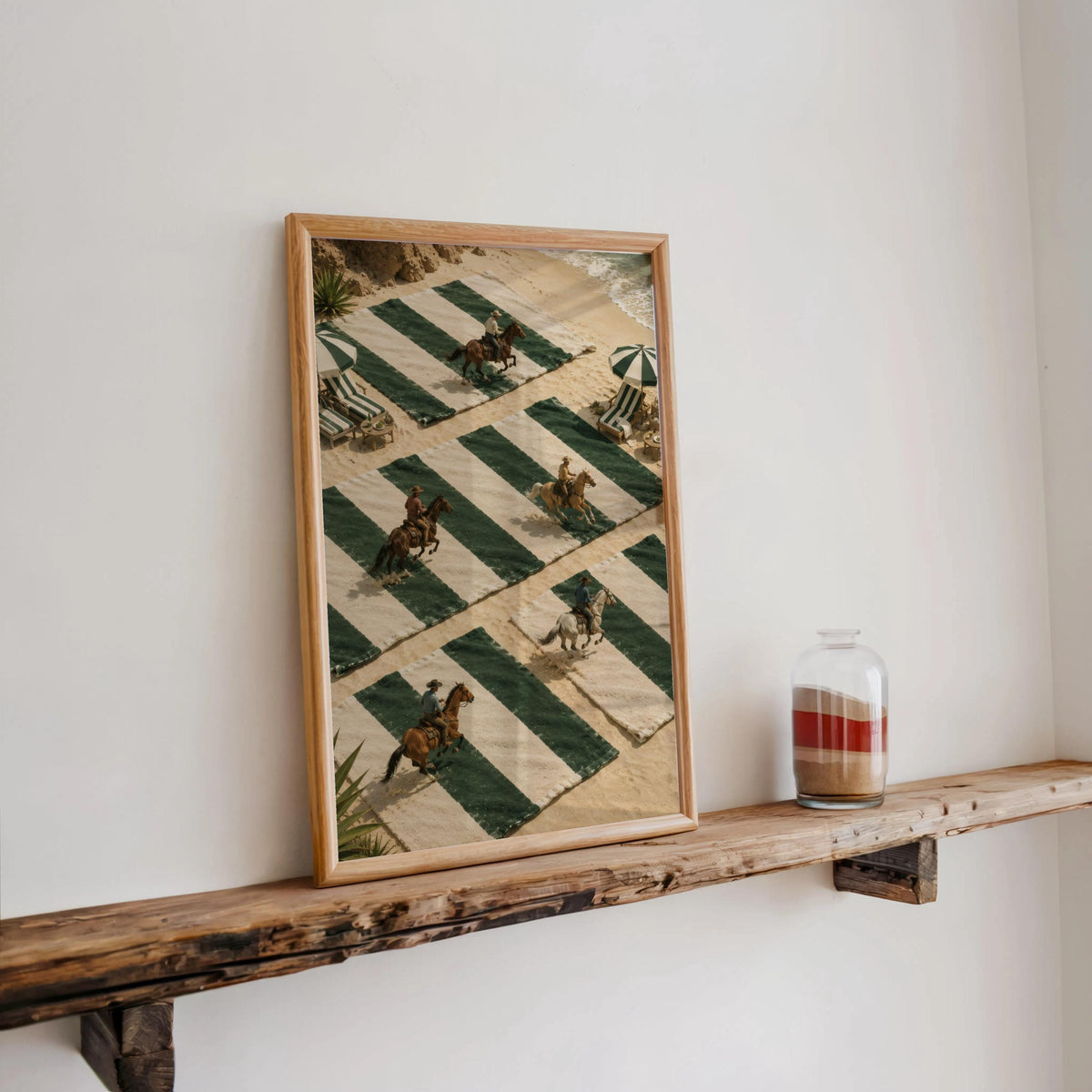 Framed preppy western decor on narrow shelf, tiny horse riders on oversized green and cream towels, western summer decor vibe