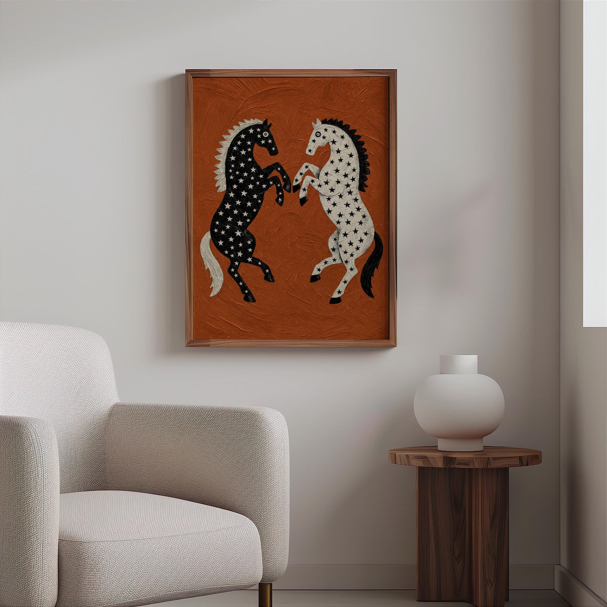 Hanging equestrian wall art above a boucle chair and side table, minimalist room, bold star pattern horse print on rust orange canvas