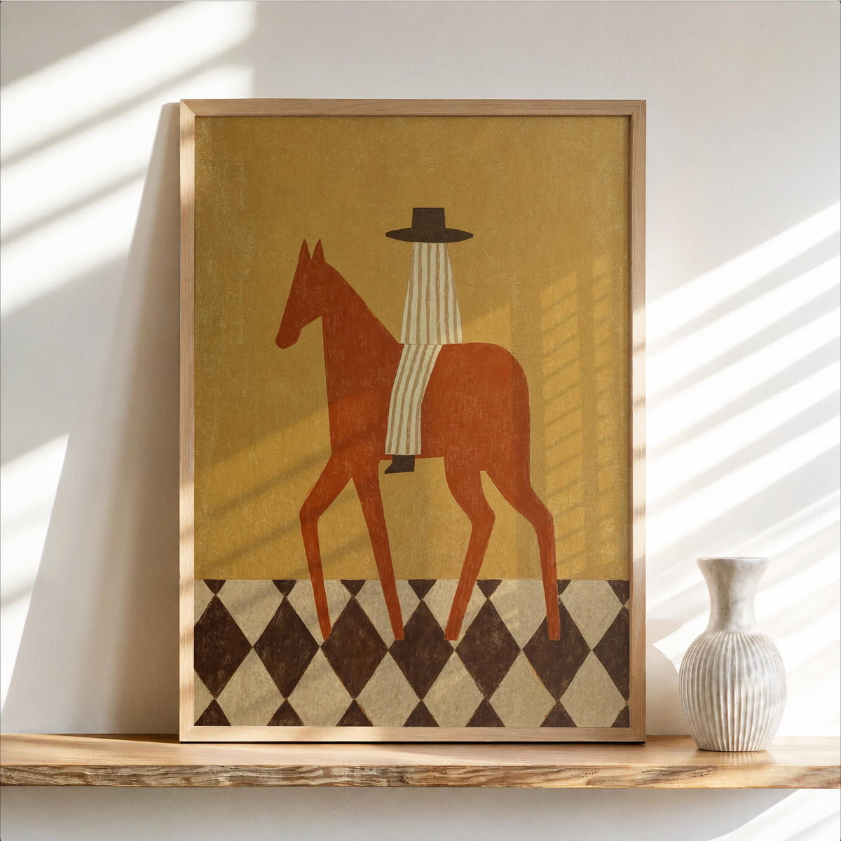Framed western horse wall art leaning on a wood shelf, mustard-gold background, terracotta cowboy and diamond border