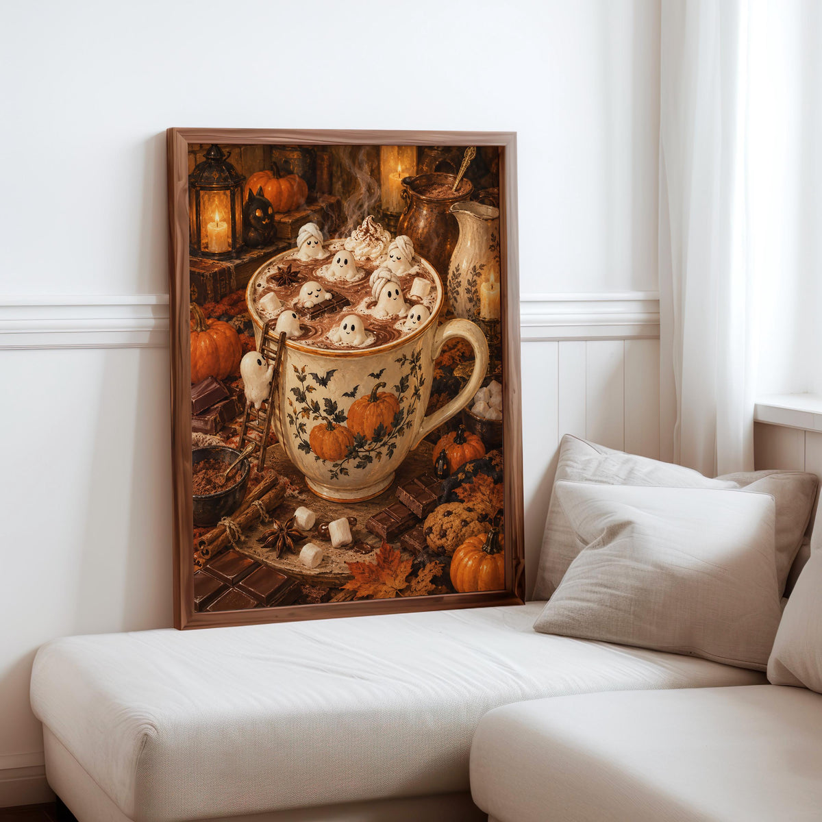 Halloween tiny people print leaning on a sofa cushion in a bright nook, fall kitchen wall art and cozy cocoa vibe