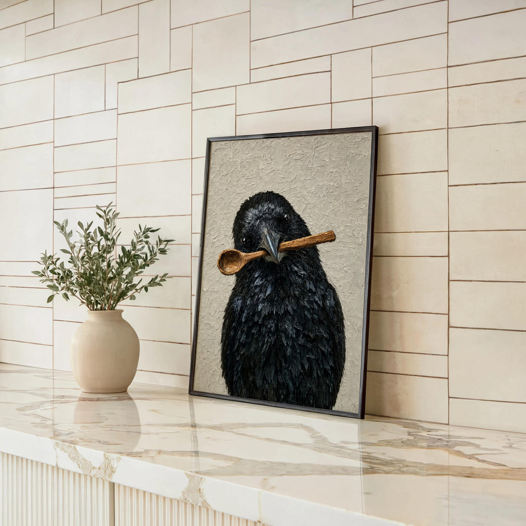 Funny crow wall art leaning on tiled kitchen counter, ceramic vase with greenery, quirky kitchen wall art vibe