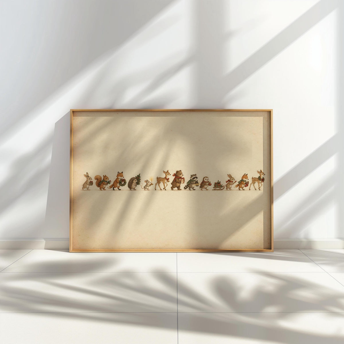 Woodland animal Christmas print leaning on the floor, dramatic sunlit shadows across cream paper