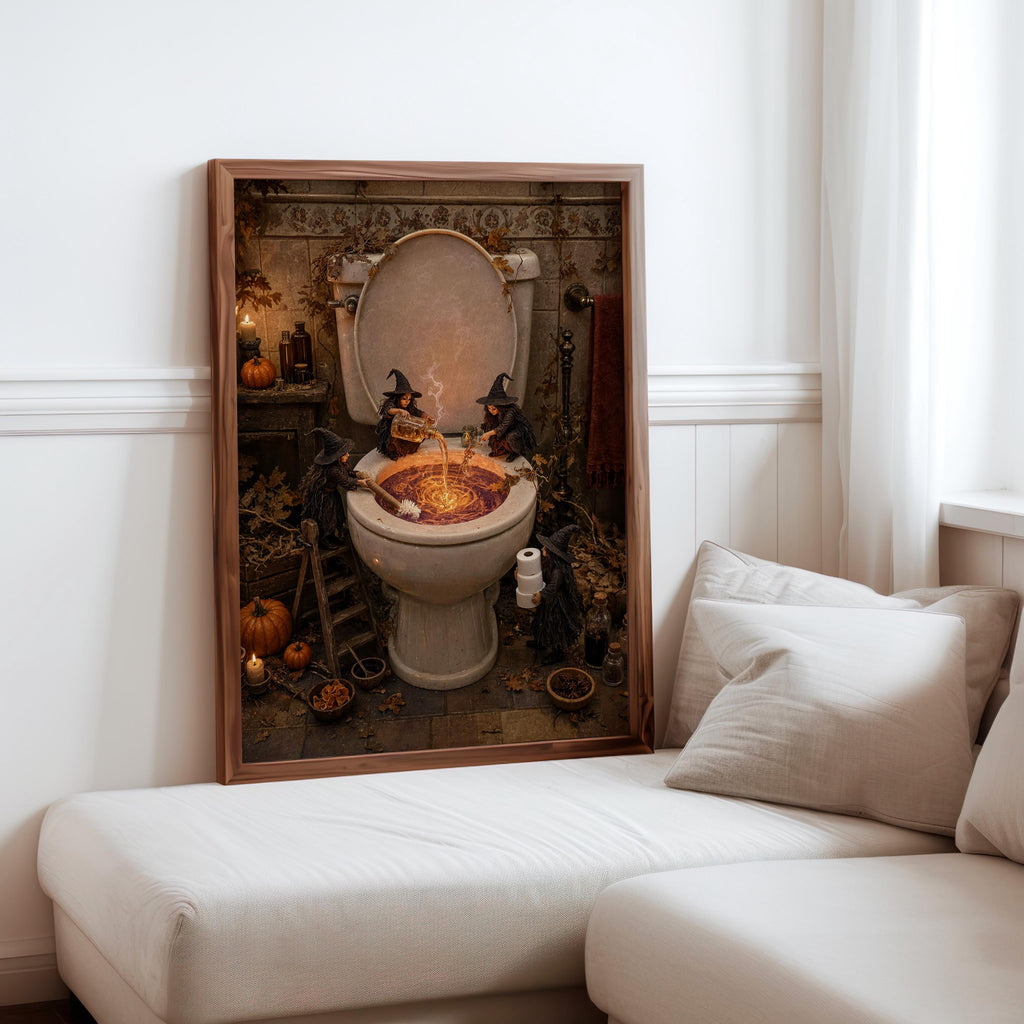Large framed spooky toilet wall art next to a sectional sofa and pillows, haunted bathroom wall art vibe.