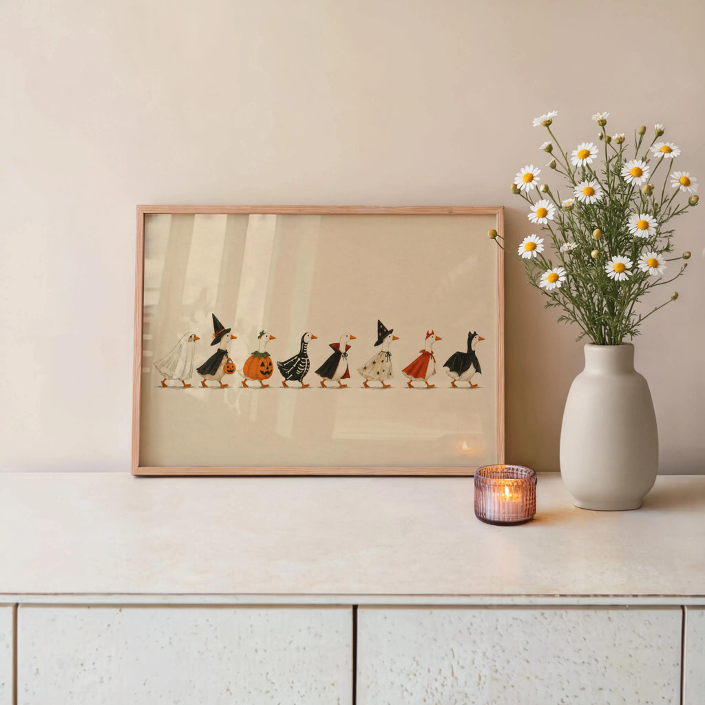 Unframed Halloween duck print leaning on console with wildflowers and candle, folk art Halloween decor