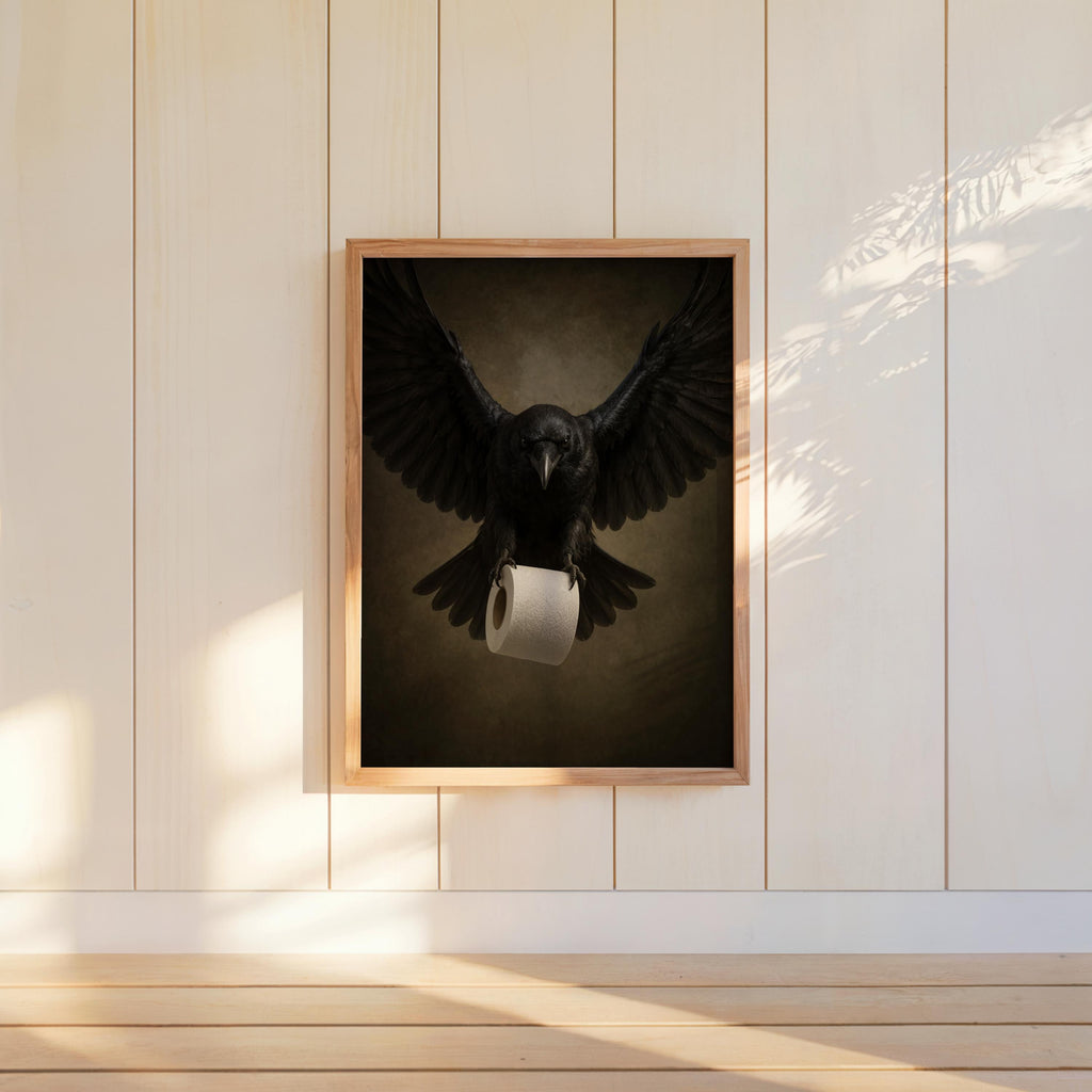Framed raven bathroom wall art hung low on white paneled wall, dramatic black crow, muted brown vintage tones.