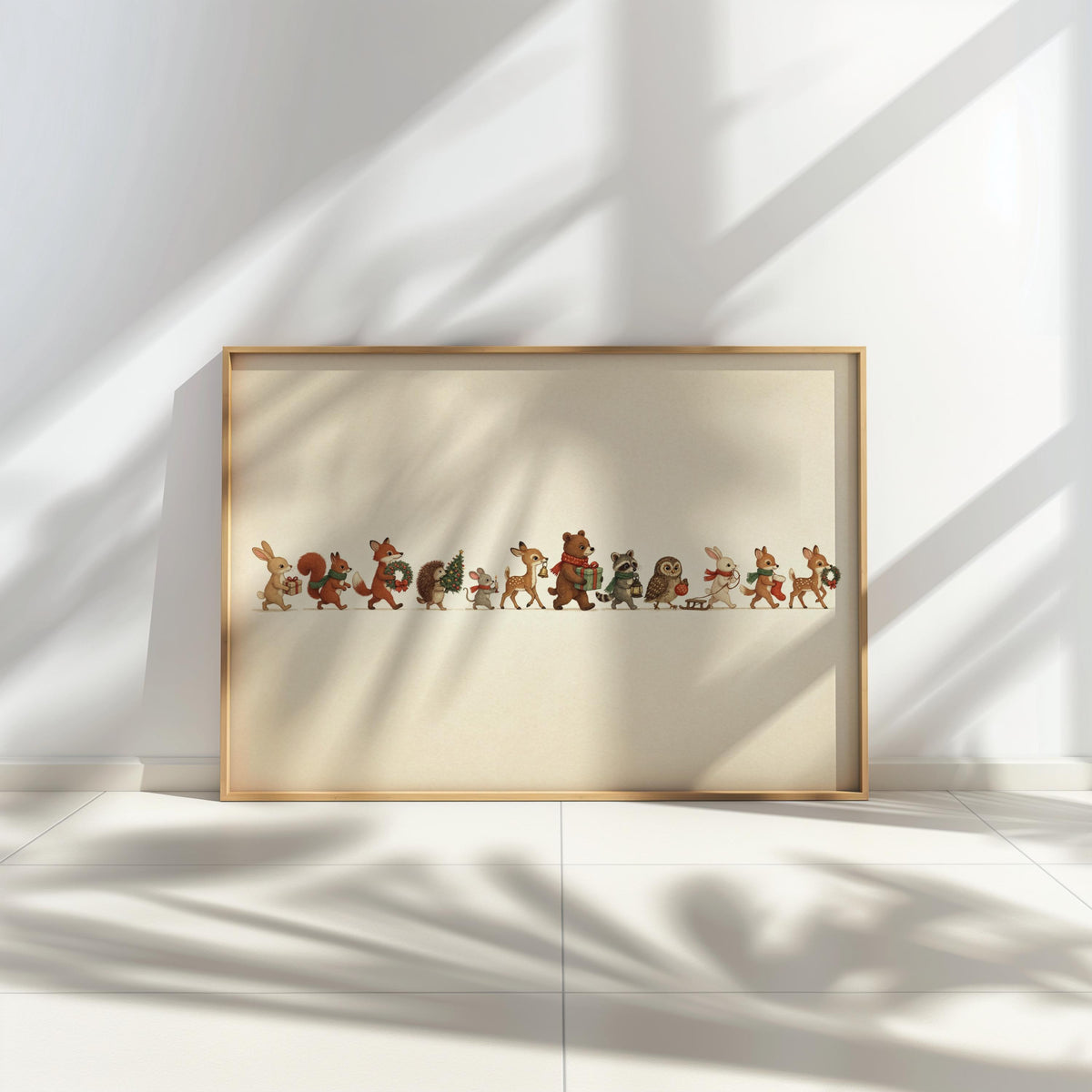 Sunlit ledge and wall shadows, framed Christmas woodland animals print horizontal composition, warm cream backdrop