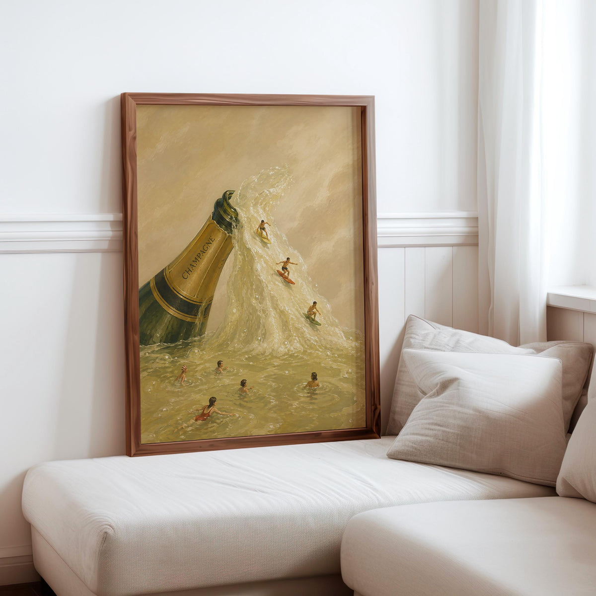 Champagne bottle wall art propped above sofa, bright white wall, muted gold stream and tiny surfers in scene