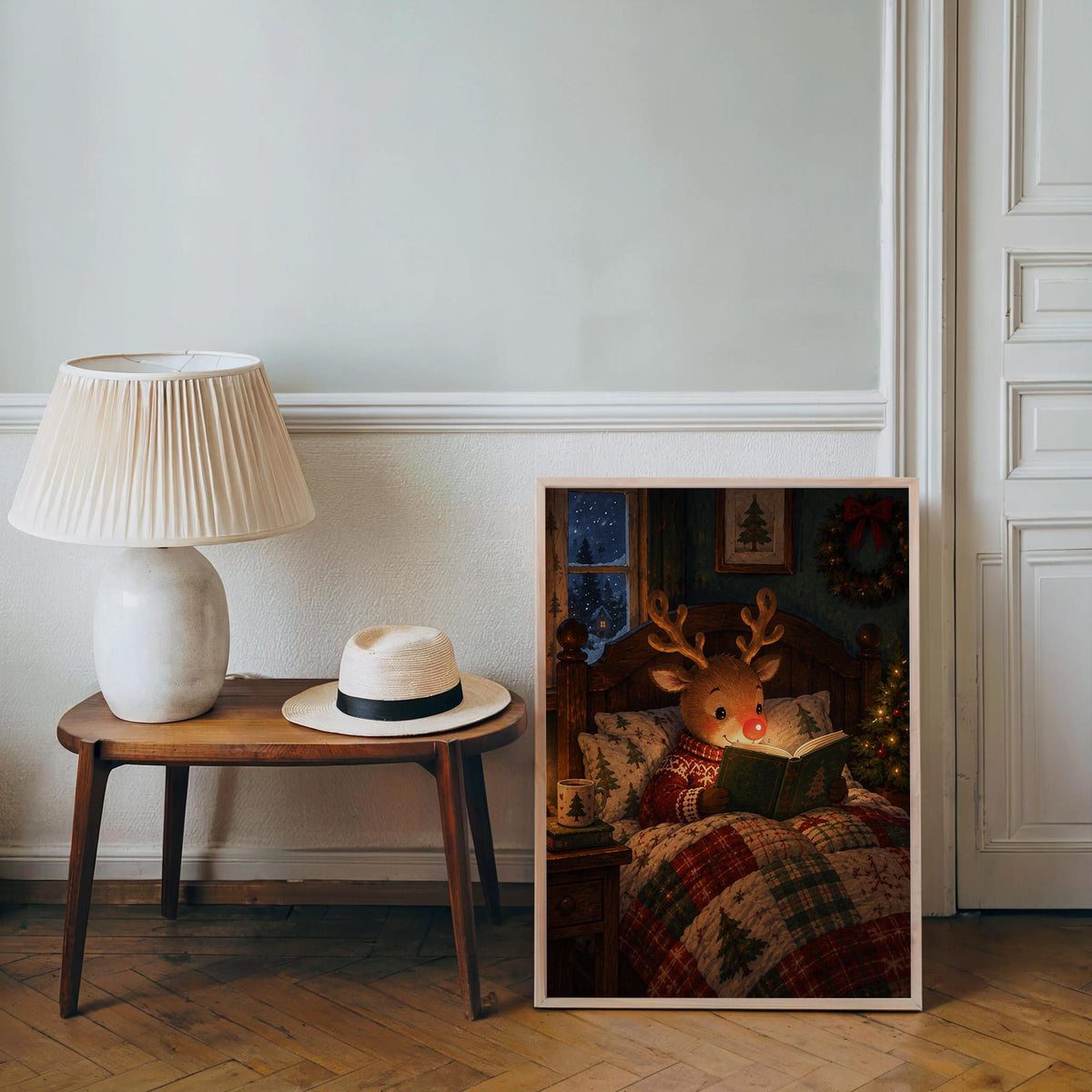 Rudolph Christmas wall art leaning by a side table and lamp, rustic Christmas wall art for cozy bedroom decor
