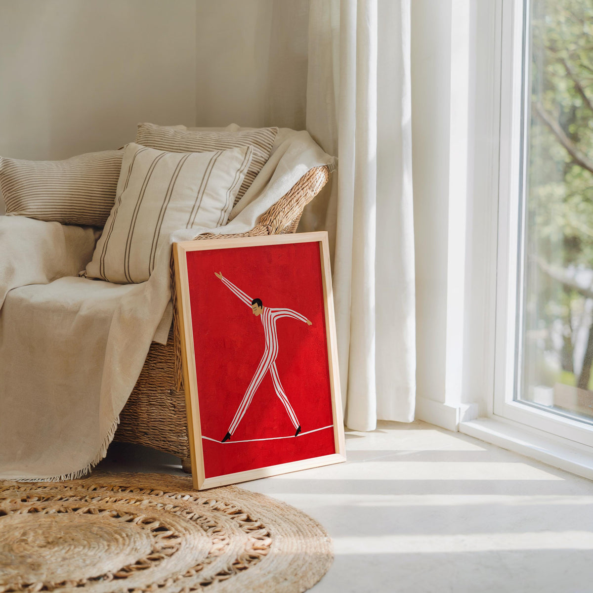 Leaning tightrope walker wall art print by a sofa, mid century vibes, quirky circus wall art