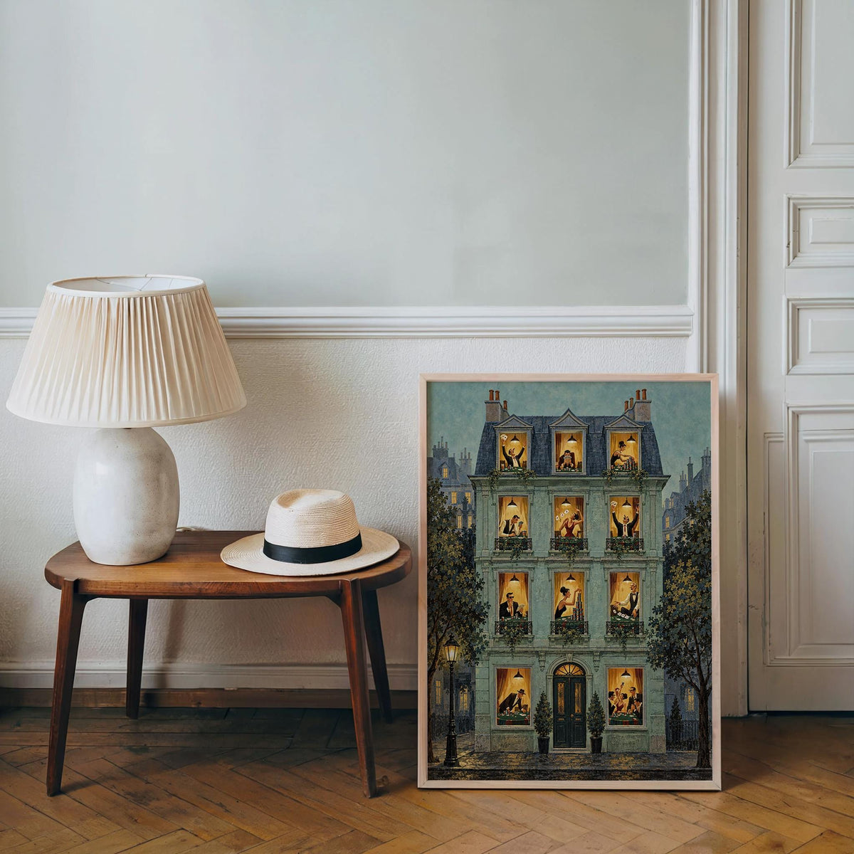 Blue-green poster leaning against wall near lamp, cozy poker scenes visible, poker room decor, poker night wall art