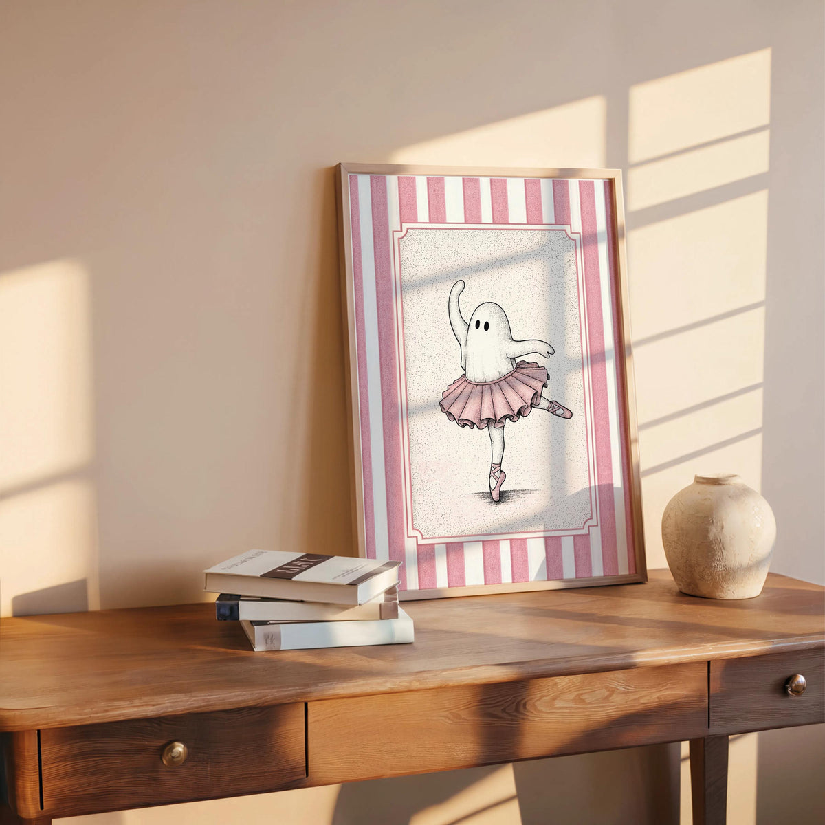 Ballerina ghost poster on a wooden console bathed in warm light, pink tutu ghost print for bedrooms
