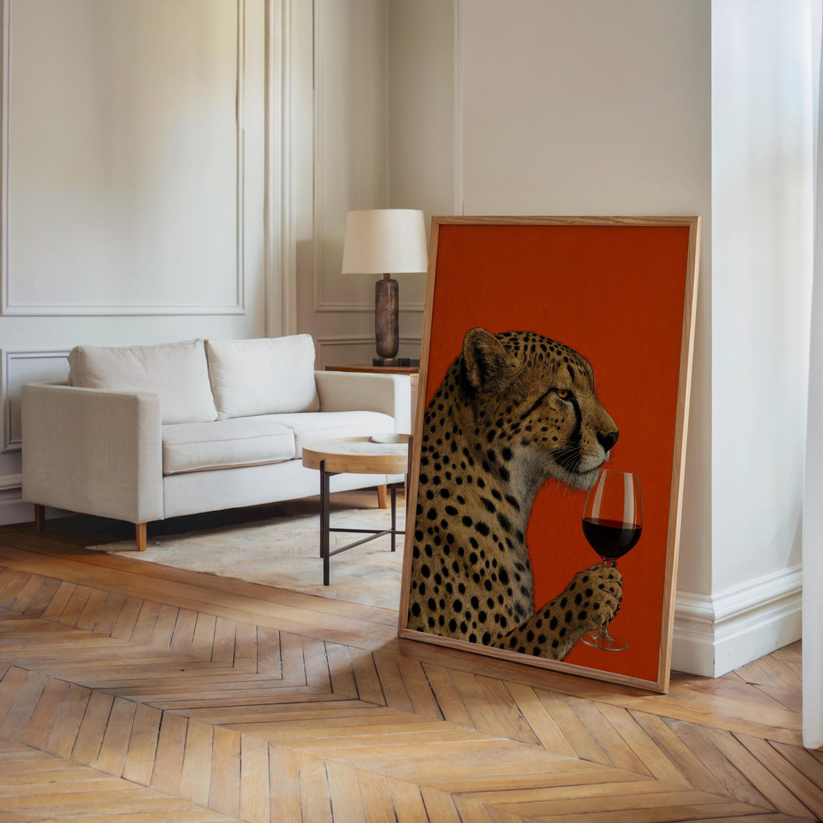 Cheetah wine wall art leaning in a bright living room near a sofa, maximalist animal art meets vintage charm.
