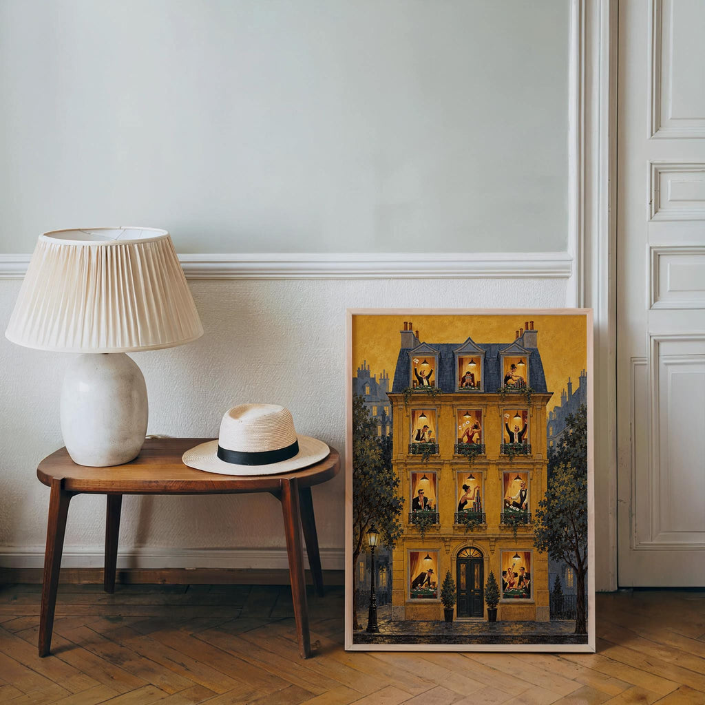 Mustard print leaning on floor by console table, lamp and hat nearby, poker night wall art