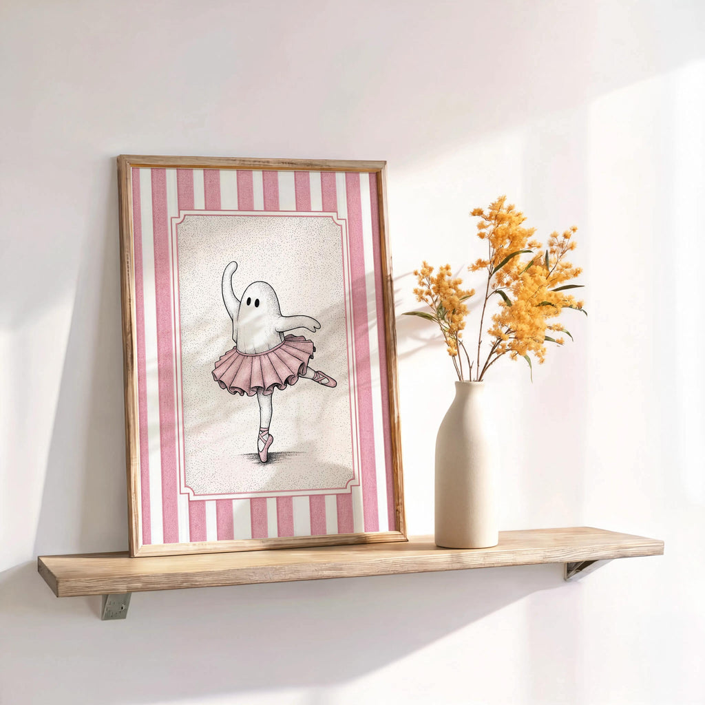 Framed ballerina ghost poster on a rustic shelf with dried florals, cute ghost poster and pink-striped border